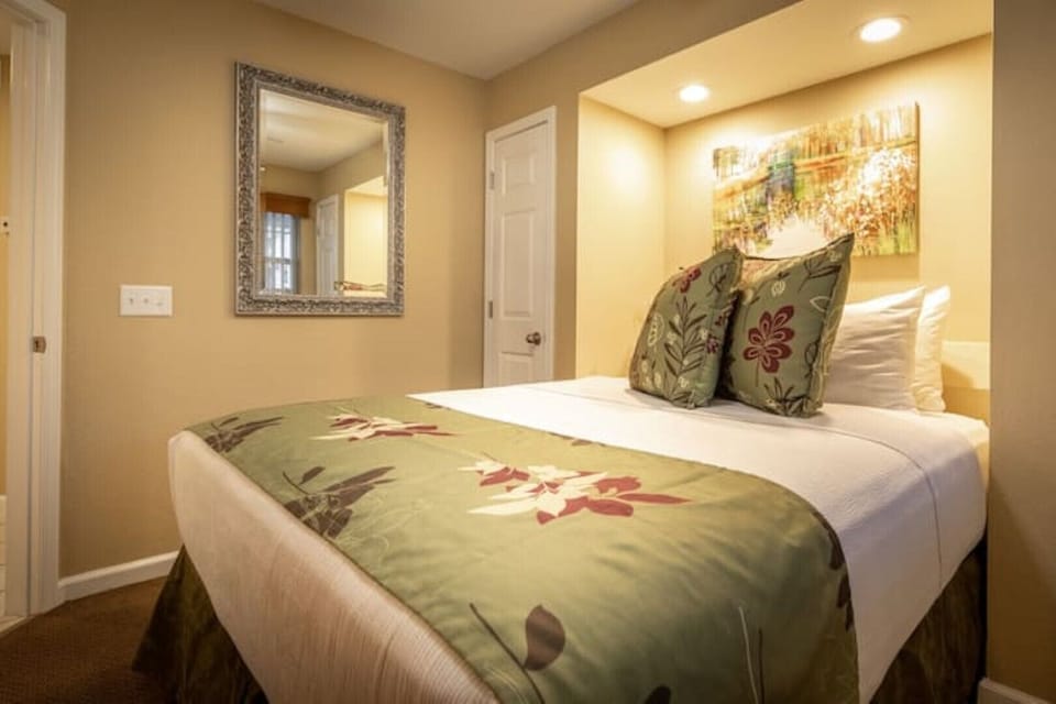 The plush queen bedding in the guest bedroom is waiting and ready for you.