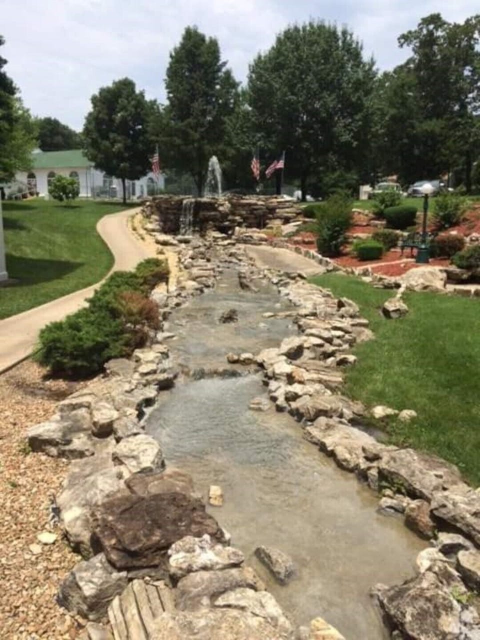 The waterfall is a welcome sight as you enter the resort.