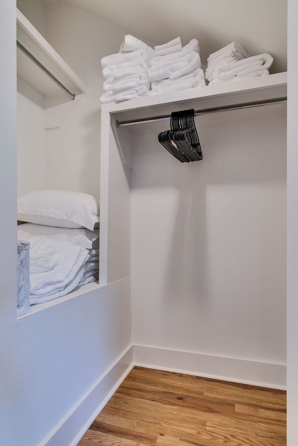 A spacious walk-in closet in each primary bedroom, perfect for all your luggage and storage needs.