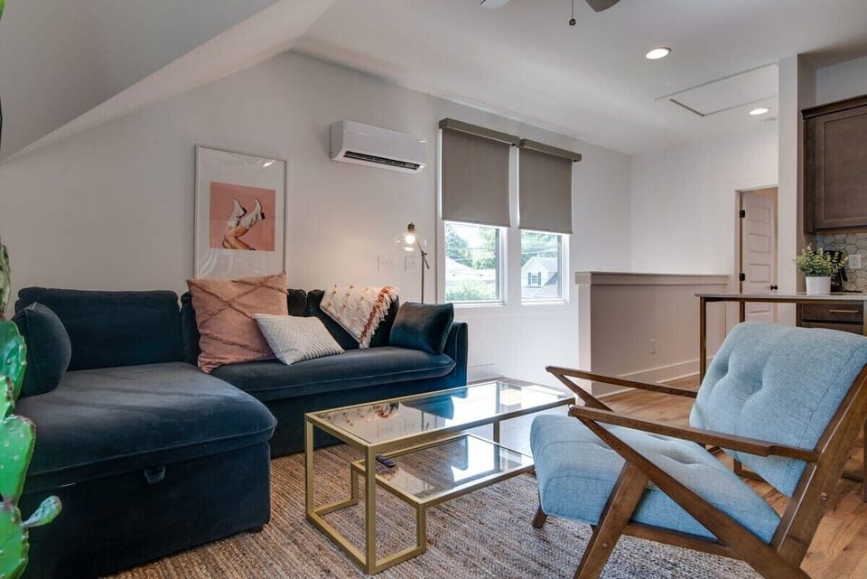 Welcome to your six-home retreat, each with its own cozy living space, open kitchen, and one-car garage.