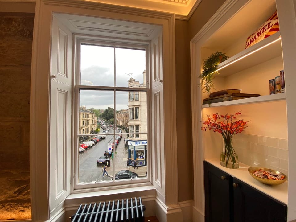 The Social Space features stone columns and cast iron radiators