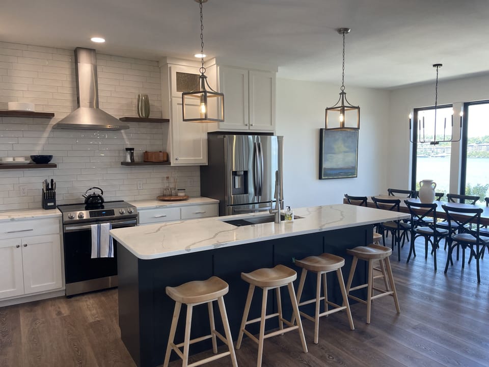 Fully stocked kitchen with seating for 5 at large island 