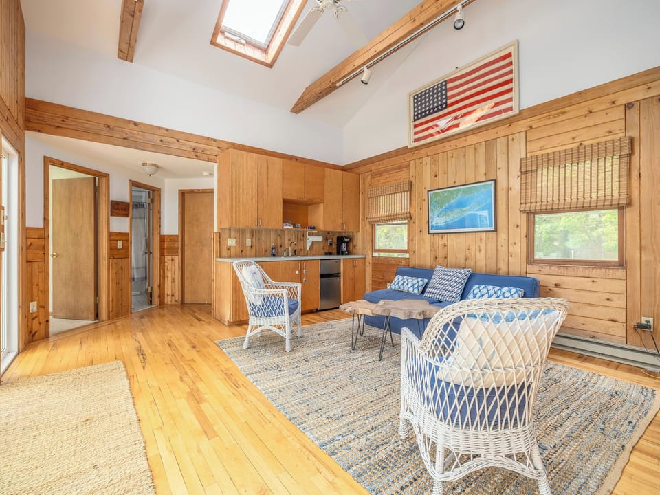 Common room in poolhouse with kitchenette, mini fridge, coffee maker