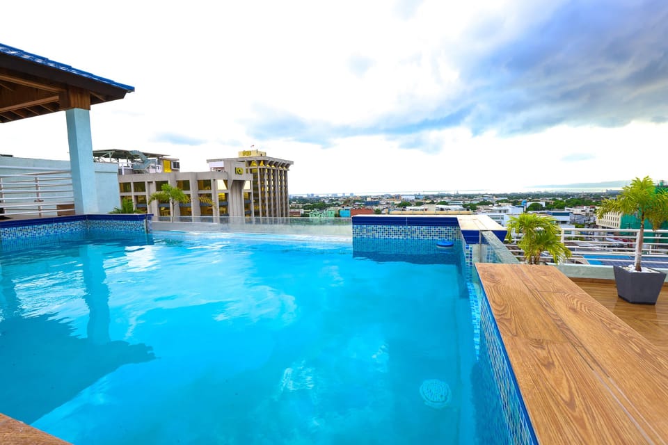 Clean and beautiful Pool. 24 hr access on top of roof.  Over looking city. 