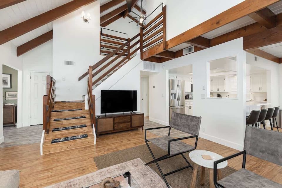 The stairs lead up to the loft and master bedroom. 