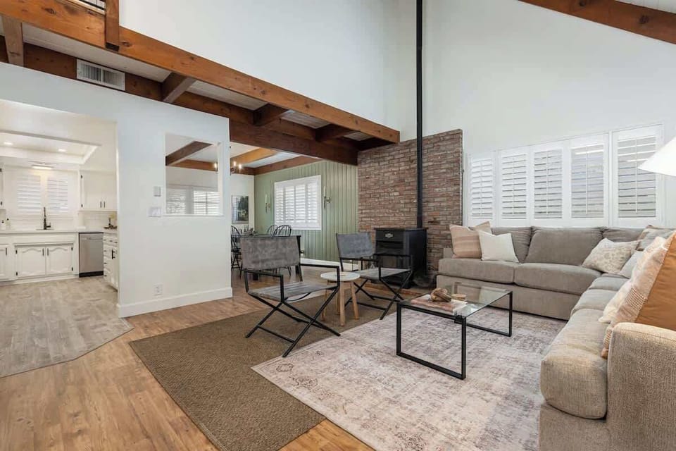 Come right in to this open, airy, and inviting living room space.
