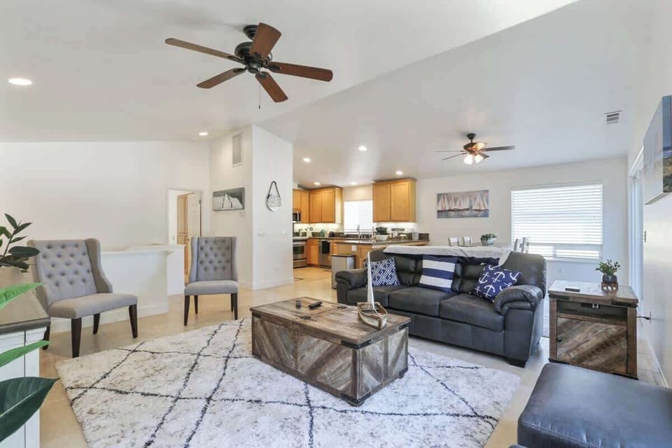 Living Room with sleeper couch, kitchen and laundry upstairs. Master bedroom upstairs.