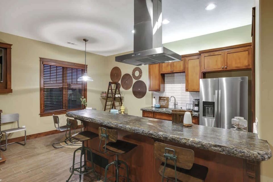 Cozy kitchen and dining area with bar seating