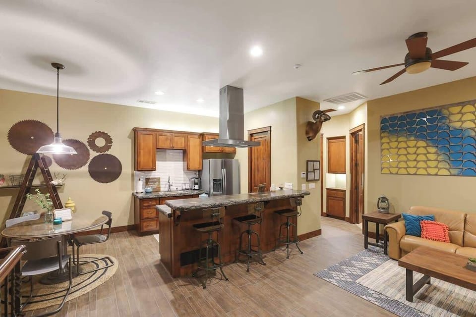 Open concept living, kitchen, and dining loft.