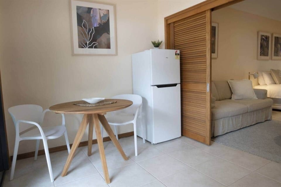 Latitude 17 - Suite 2 - Through entry door into dining & kitchen