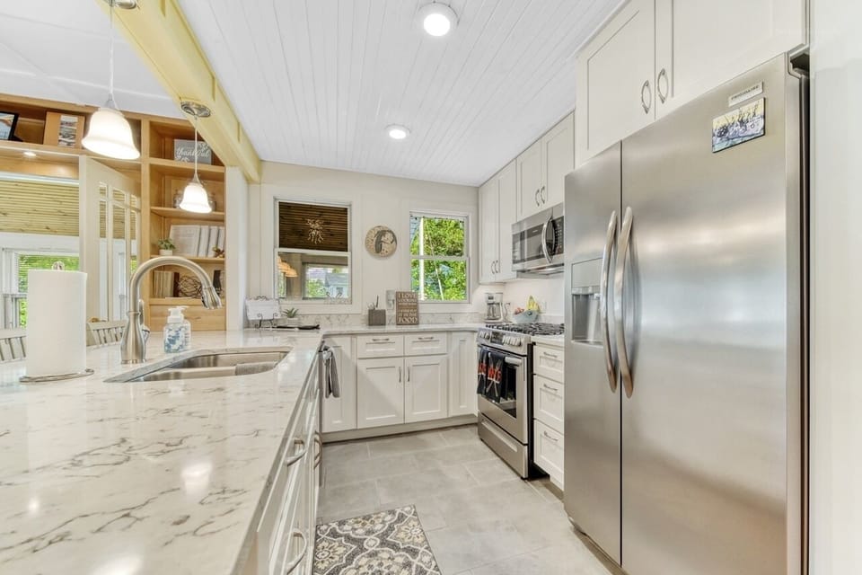 Fully stocked kitchen with gas stove
