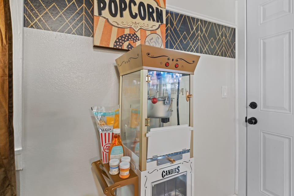 Popcorn machine along with popcorn & candies supplies provided