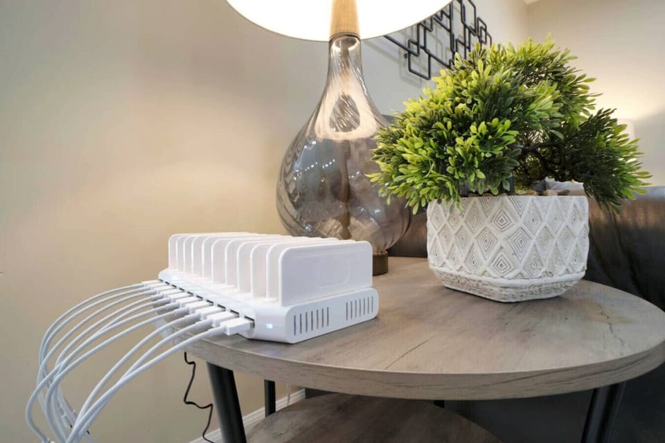 Make use of the charging station with multiple USB ports, allowing for easy charging of devices.