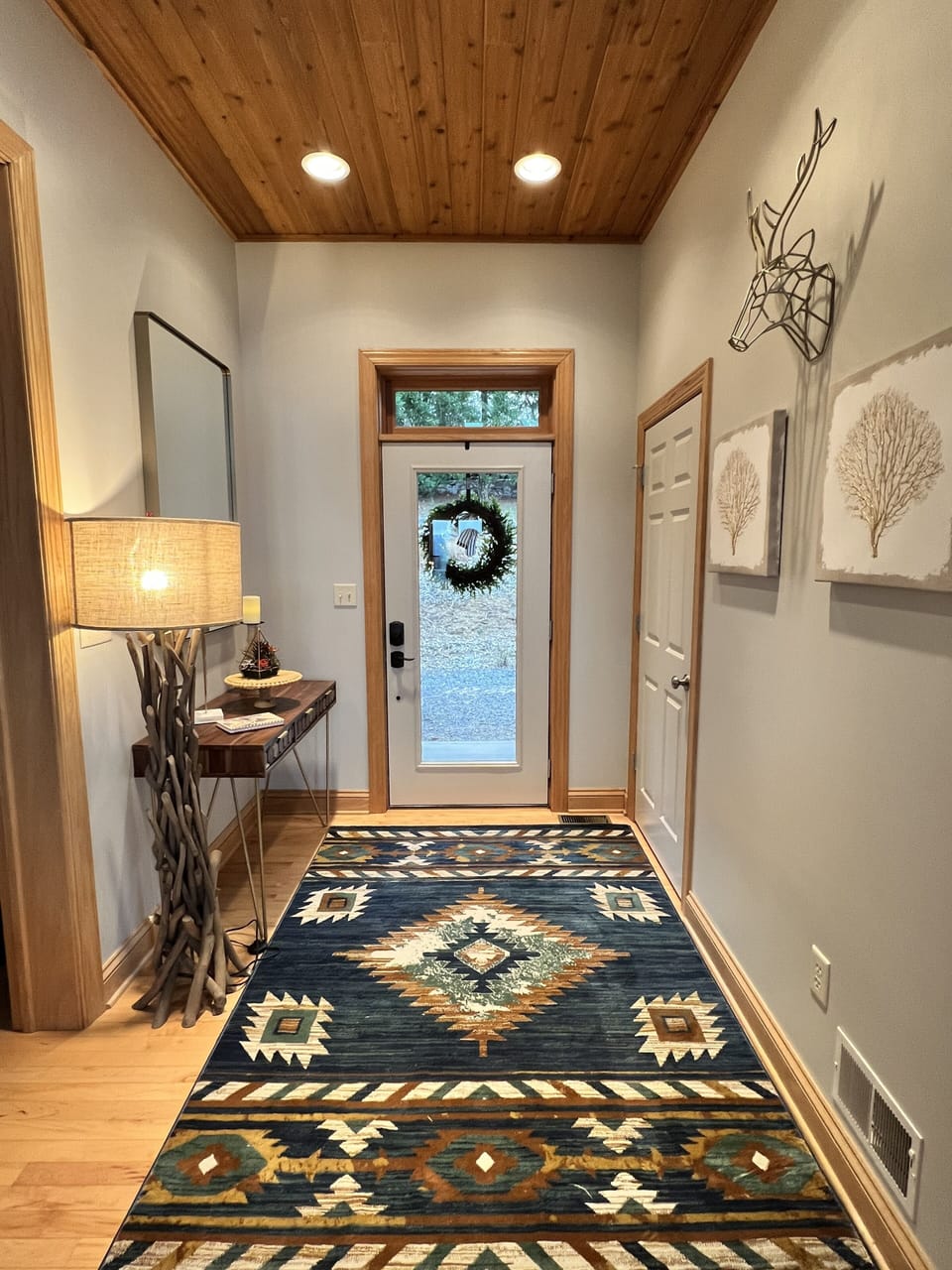 One low profile step to the porch and WELCOME, you have arrived! Exhale!