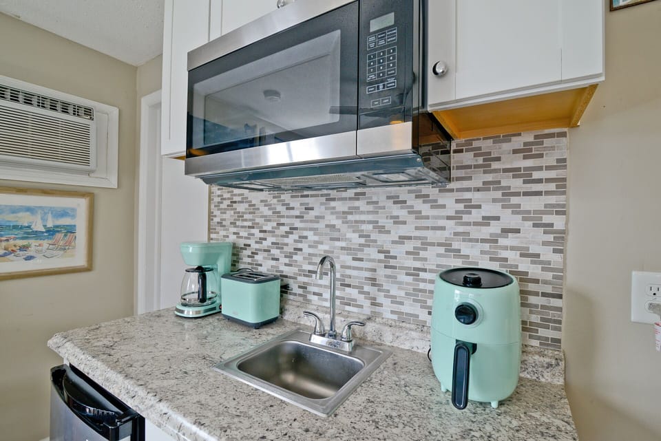 Microwave and mini fridge.