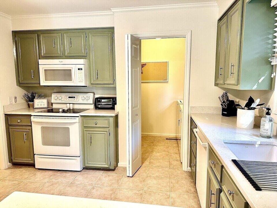 Kitchen space looking into the Laundry Room