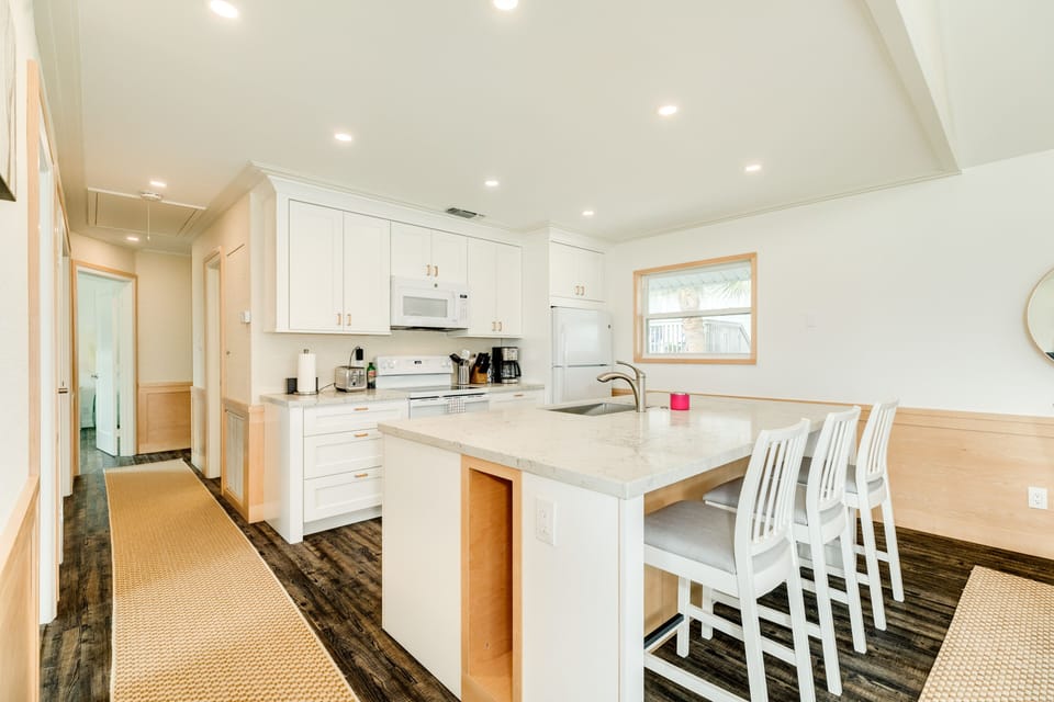 Grab a quick snack or eat meals at the breakfast bar seating 3