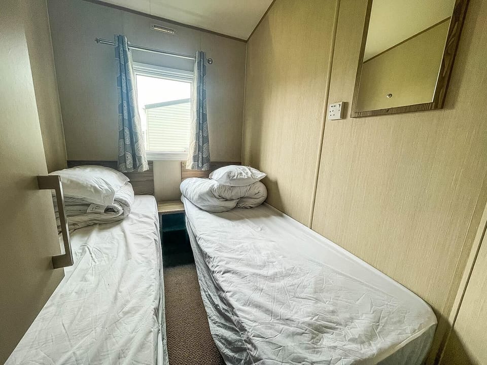 This holiday home is perfect for families looking for a memorable coastal escape, where you can retire to comfortable bedrooms.