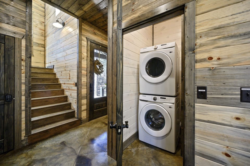 Laundry closet and stairs to master bedroom