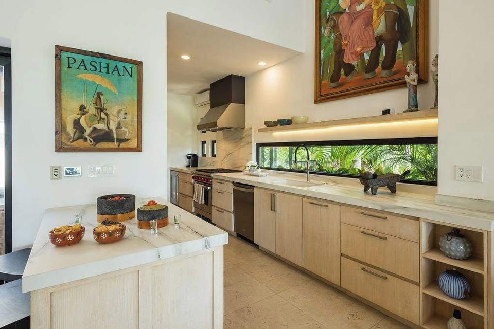 Fully equipped beach house kitchen with modern appliances