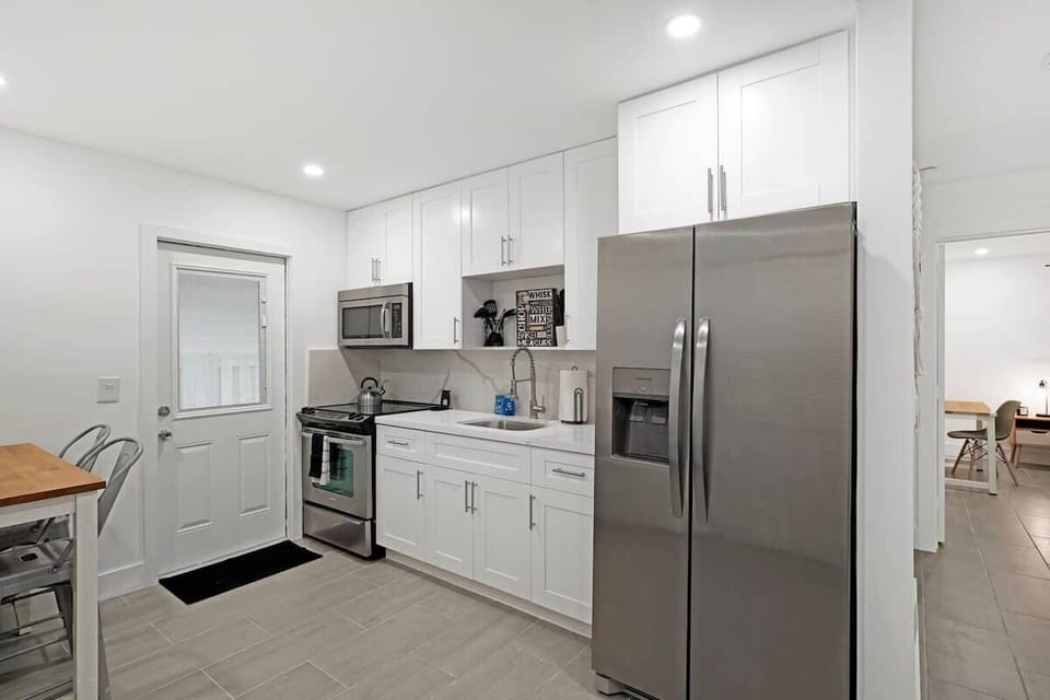 High-quality appliances that include a refrigerator, oven, microwave, and dishwasher, ensuring all your cooking and cleaning needs are met.