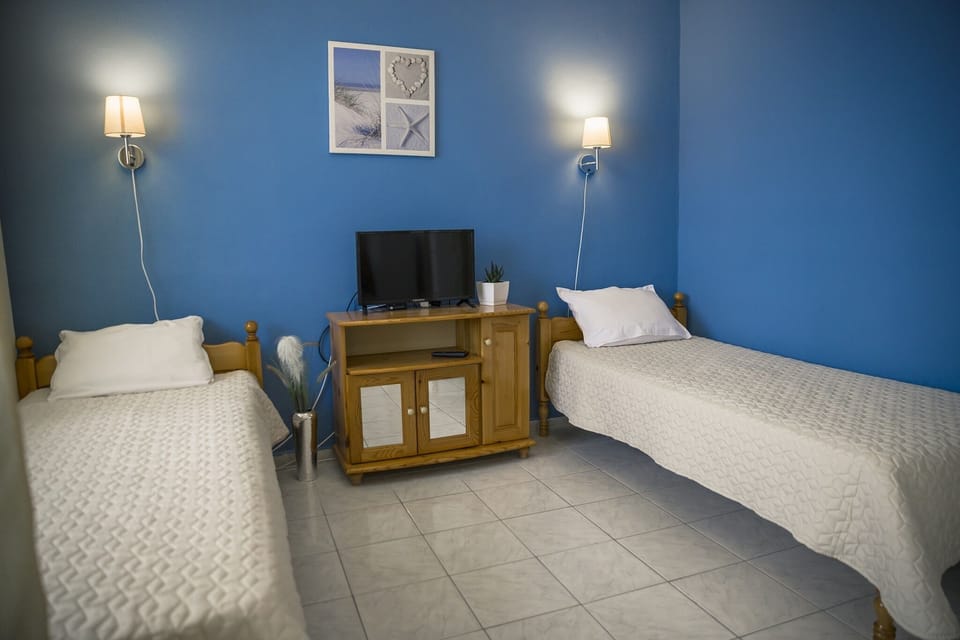 two separate beds, TV