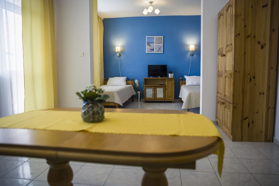 part of the bedroom, two separate beds,large terrase