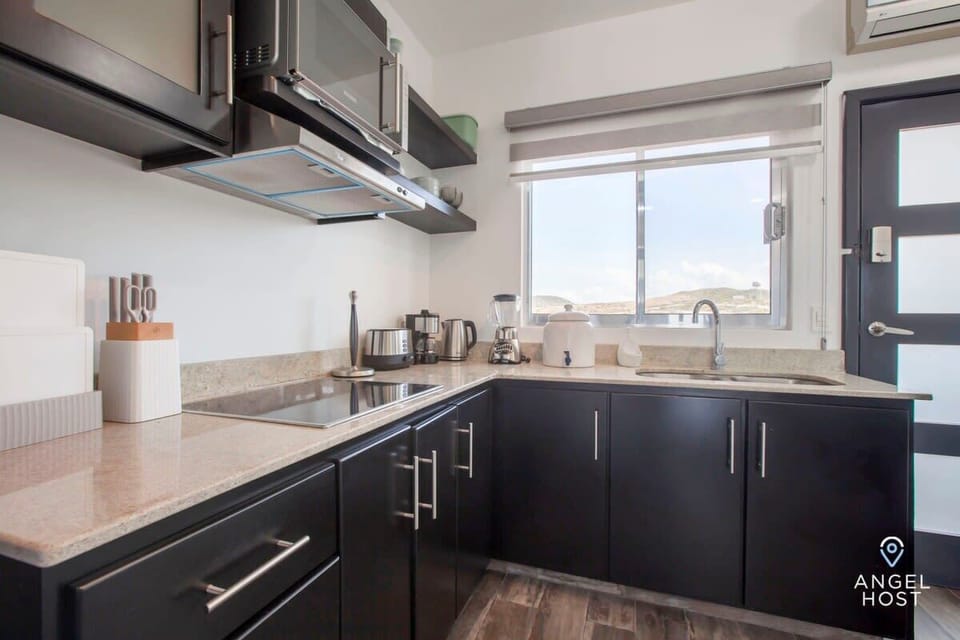 The kitchen is well-equipped to prepare a meal at home
