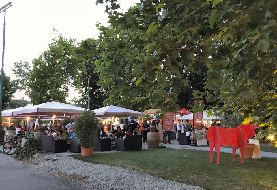 Outdoor bars and restaurants in the riverside park open in spring and summer