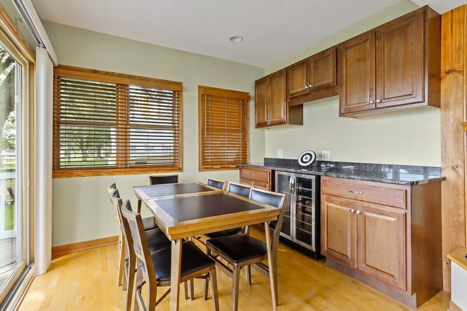 Seating and bar area with wine fridge