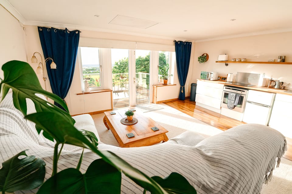 A perfect nook to cosy up and watch TV- if you can take your eyes off the waves