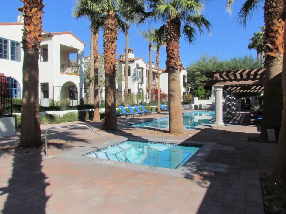 Lap pool and hot tub below the Villa