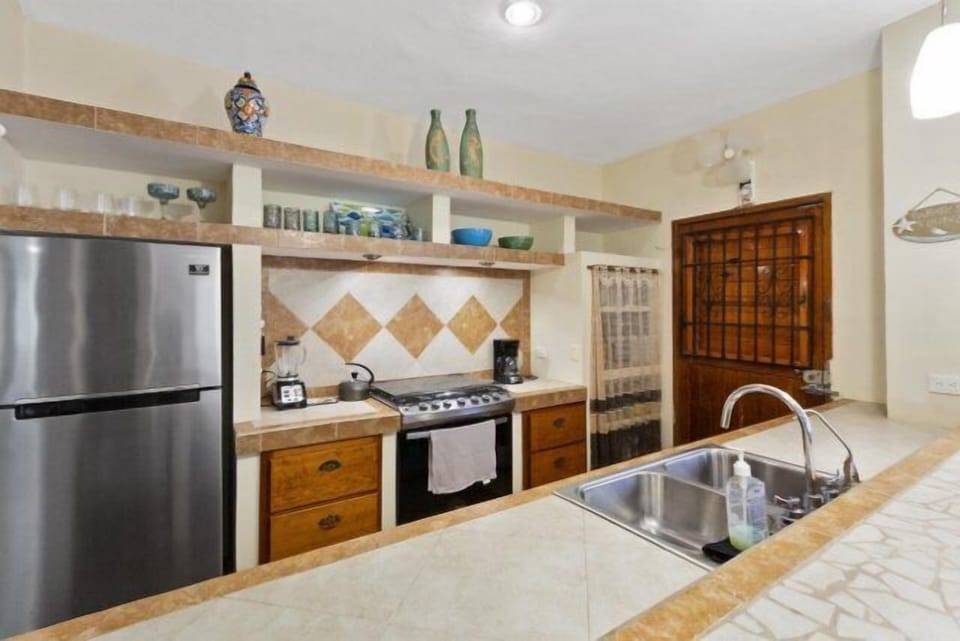 The kitchen is fully equipped.