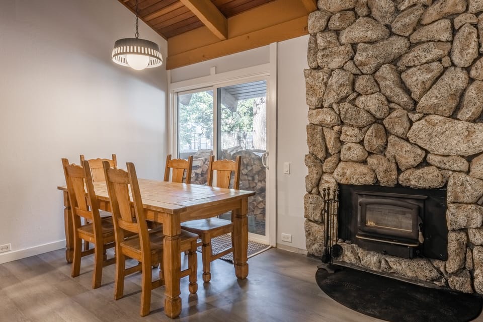 Dining Table and Wood Burning Fireplace , Deck