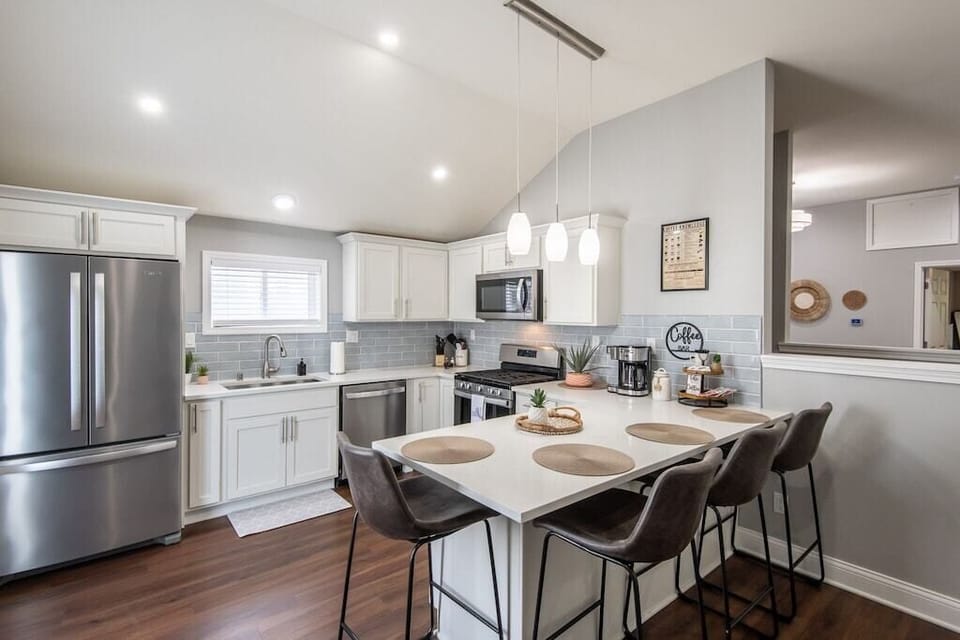 Upper kitchen- Stainless steel appliances (refrigerator, dish washer, microwave, and stove 