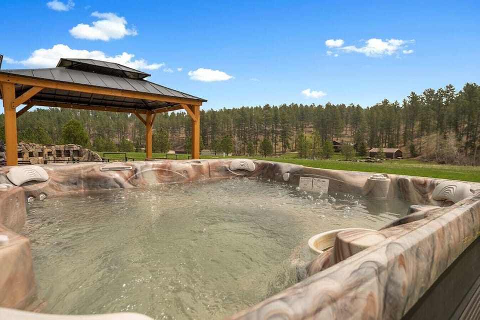 After a day of exploring or outdoor adventures, soak your cares away in the nice-sized, private hot tub.