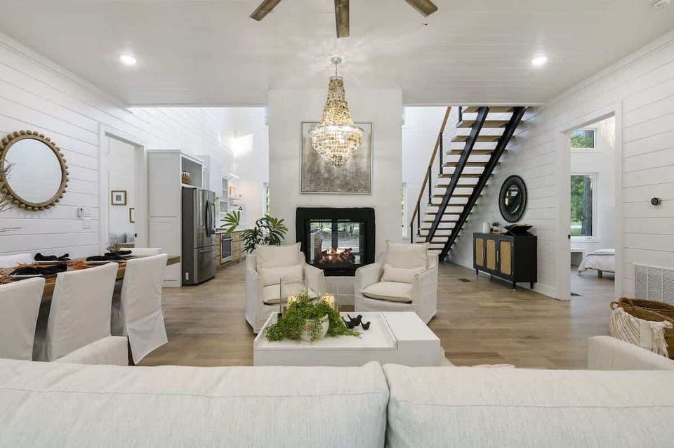 Open concept living room with see through fireplace!