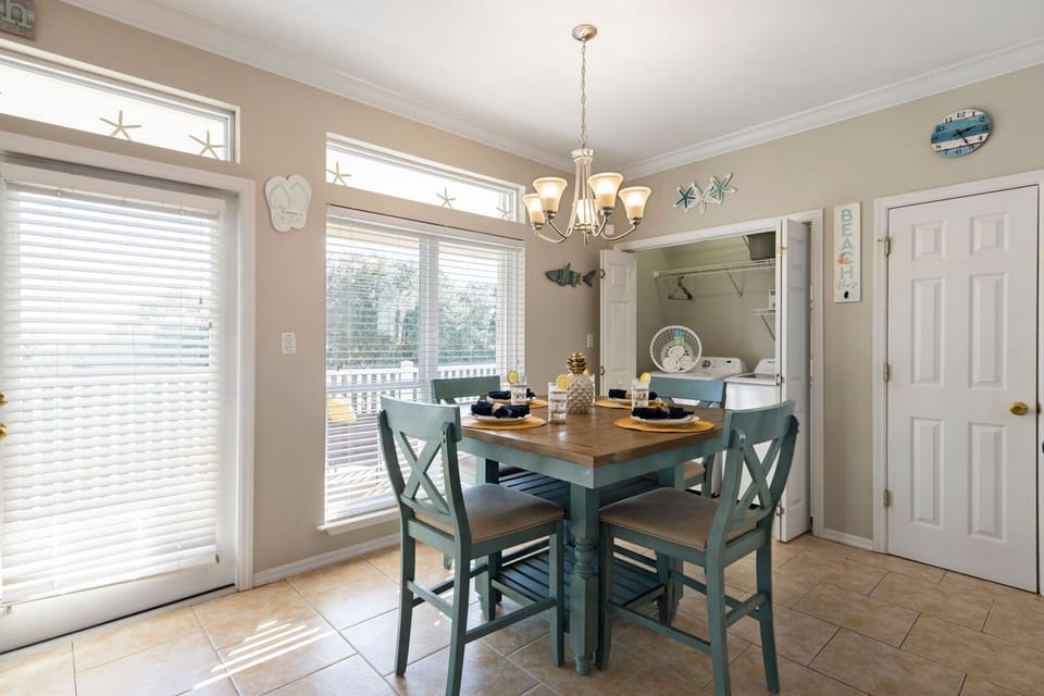 Dining Area offers a 4 top table inside, with additional seating at the bar.