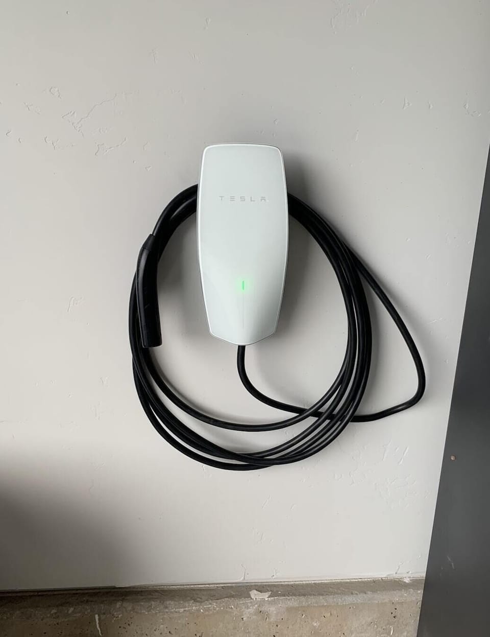 Tesla EV charger in the garage