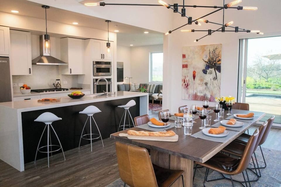 Fully appointed chef's kitchen and dining area with everything you need to cook a gourmet meal.