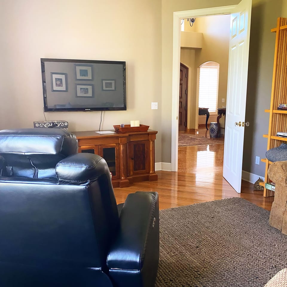 Den with sectional and comfortable recliner