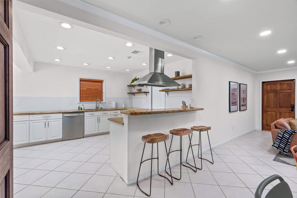 Cook in this stainless steel kitchen w/ /5-burner gas stove, coffee bar & more!