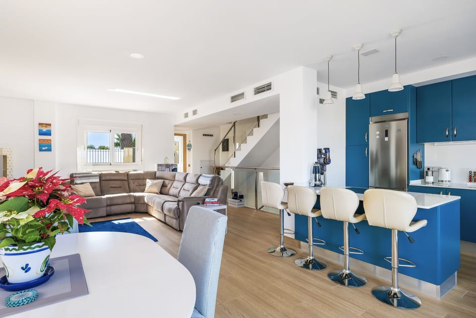 View from rear patio doors into kitchen and lounge.