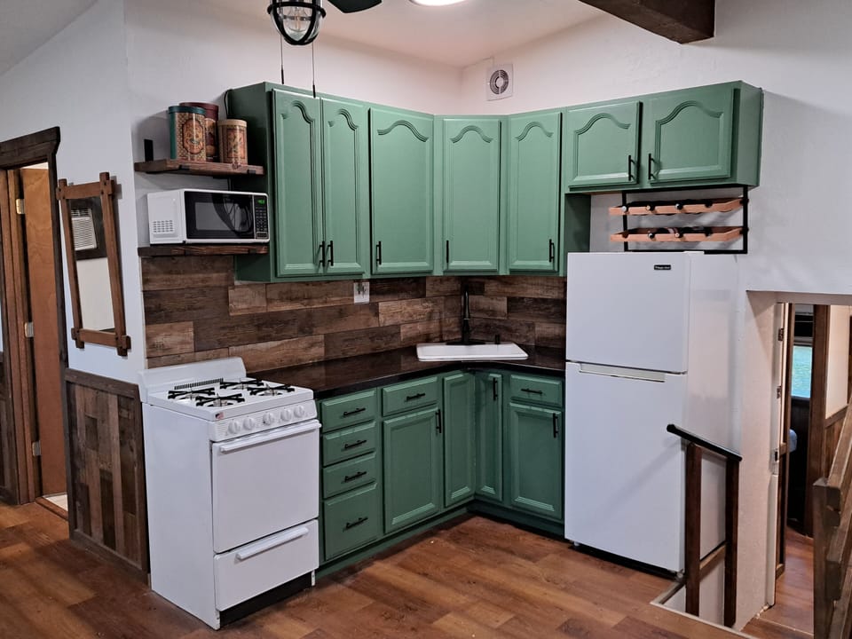 Kitchen. The attached bus entrance is down two stairs.