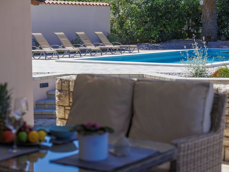 Plant, Property, Azure, Table, Water, Outdoor Furniture, Shade, Building, Chair, Swimming Pool
