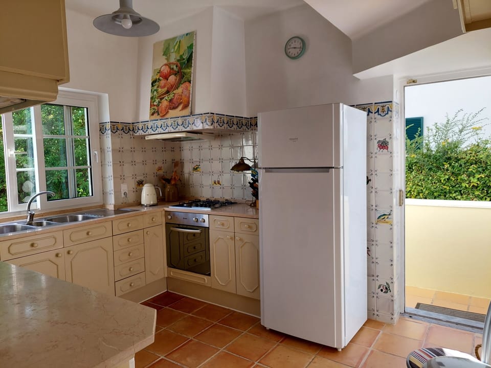 Kitchen with a back door to the garden