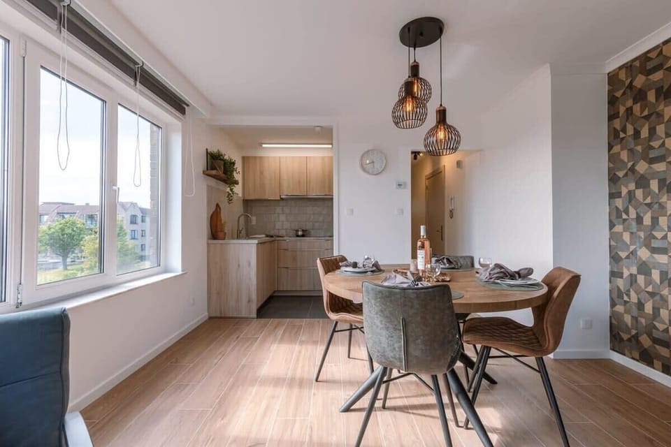 Open dining area connecting seamlessly with the living room ☀️