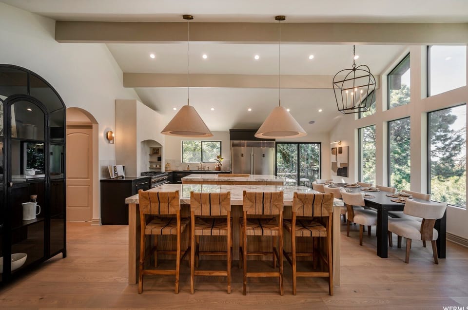 Kitchen with double marble island, over sized fridge/ freezer, espresso machine!