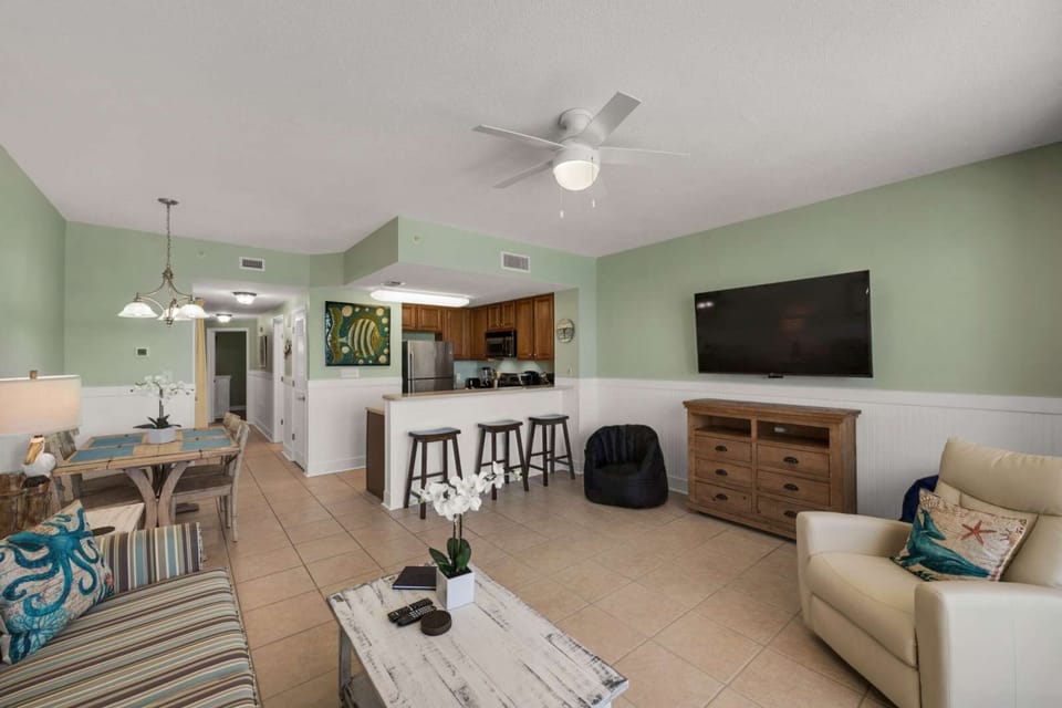open living area with a modern kitchen and dining space