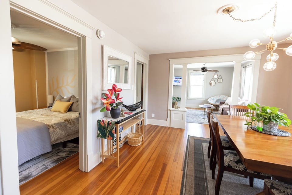 This 100yr old building boasts oversized trim and gorgeous hardwood floors!